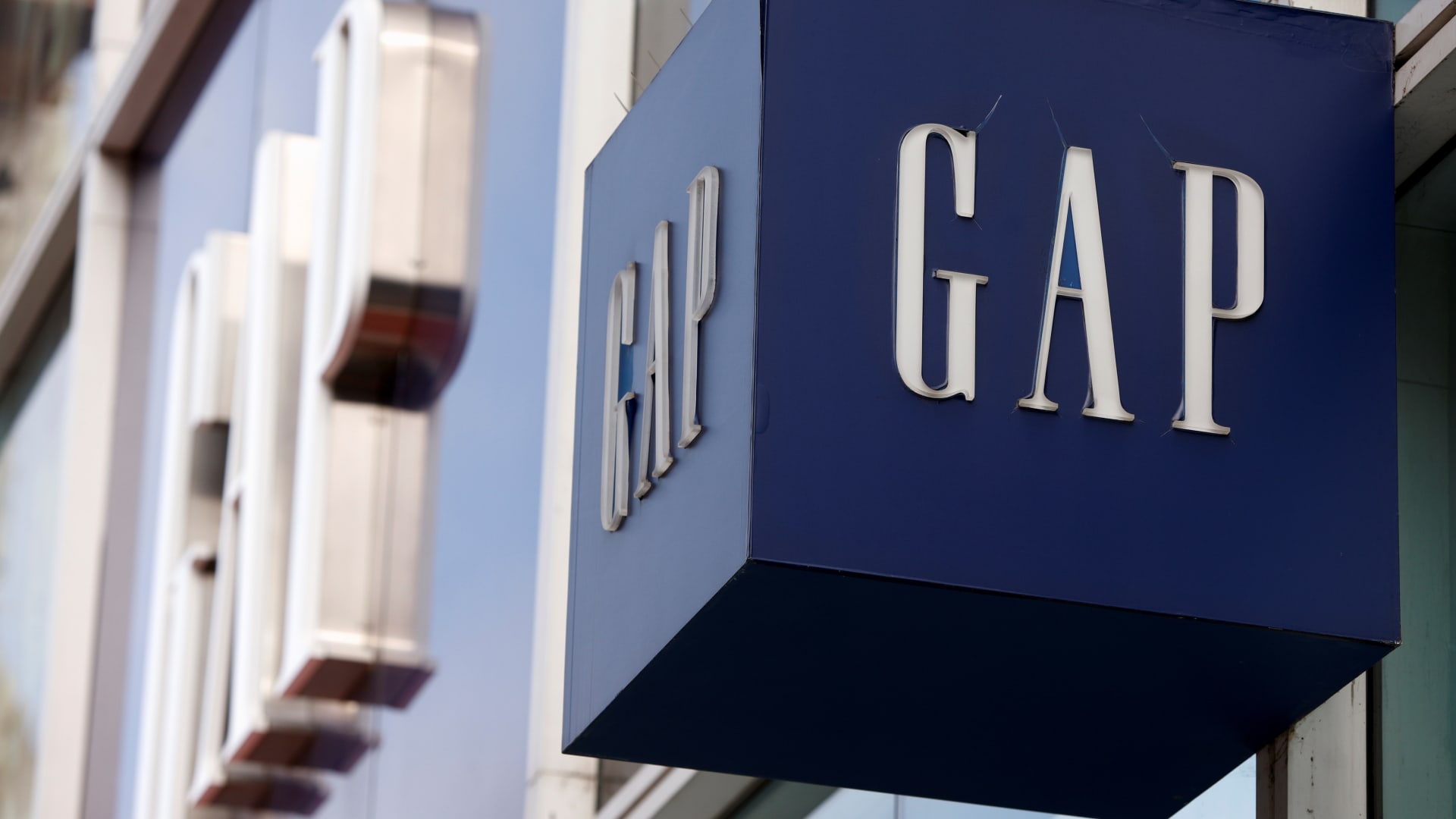 Stocks making the biggest moves midday: GAP, AEO, CRM, FIG